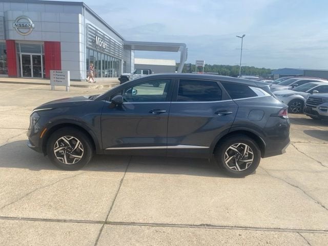 2024 Kia Sportage — rear three-quarter view